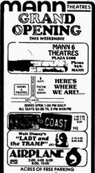 'Grand Opening this weekend!' ad for the Mann 6 Theatres Plaza 5400, with 'acres of free parking.'